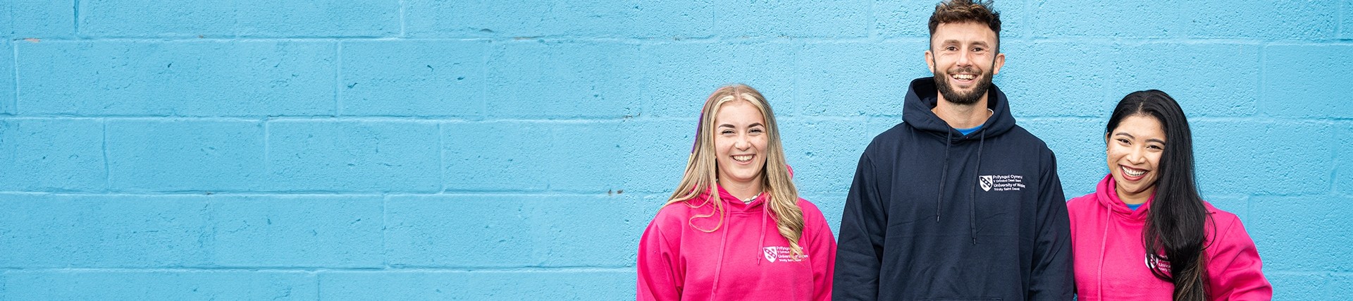 Students from the UWN Sports Academy wearing branded hoodies