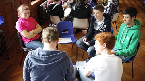 Student ambassador in discussion with potential students