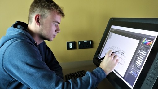 Automotive student using touchscreen technology 