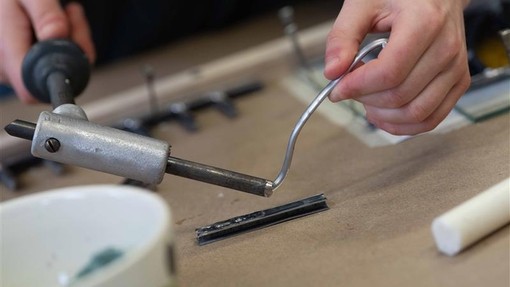 Student using craft tools