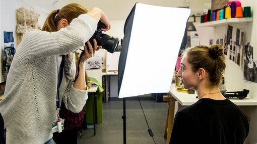 Photography students in a studio