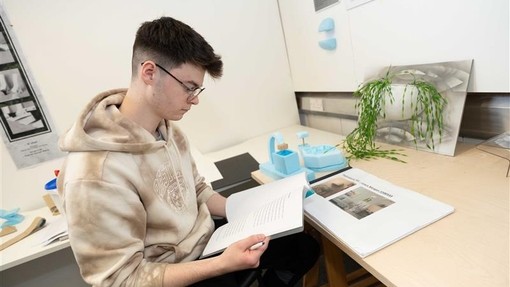 Student studying a book