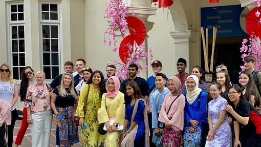Students posing for a photo in Malaysia