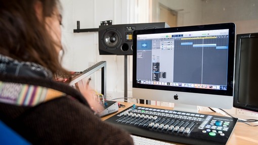 Student working on a Apple IMac
