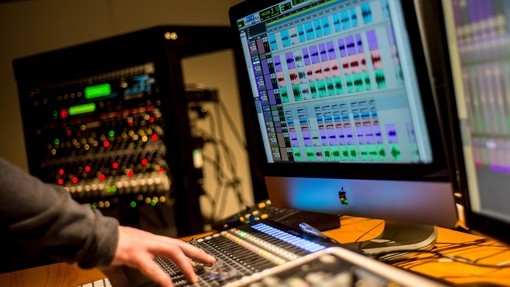 Student using music mixing software