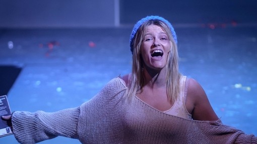 Student performing on stage
